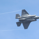 An F-35 jet arrives at it new operational base Wednesday, Sept. 2, 2015, at Hill Air Force Base, in northern Utah. Two F-35 jets touched down Wednesday afternoon at the base, about 20 miles north of Salt Lake City. A total of 72 of the fighter jets and their pilots will be permanently based in Utah. (AP Photo/Rick Bowmer)